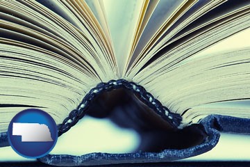 a hardcover book spine (macro photo) - with Nebraska icon