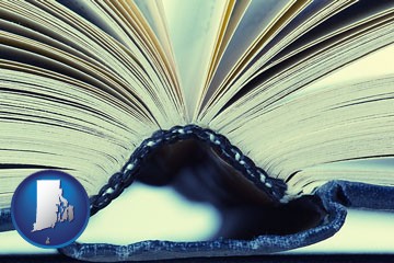 a hardcover book spine (macro photo) - with Rhode Island icon