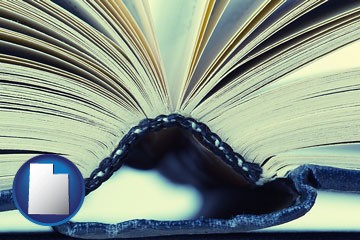 a hardcover book spine (macro photo) - with Utah icon